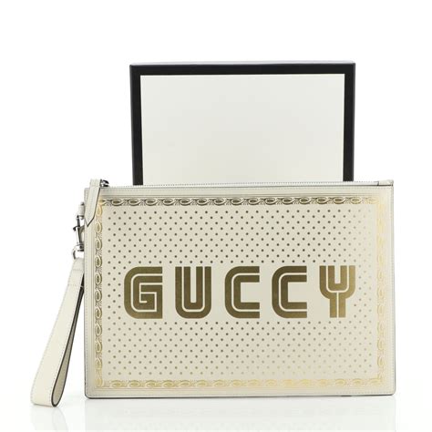 gucci pink printed leather clutch gold and beyond|Gucci clutch bag price list.